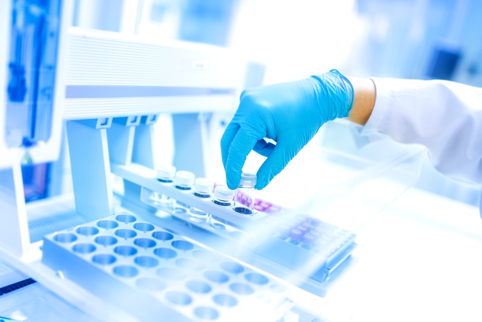 Scientist using robber gloves for handling dangerous substances
